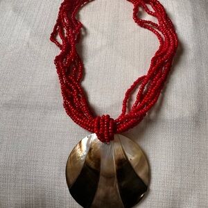 Red multi strand Beaded Necklace with Shell Pendant